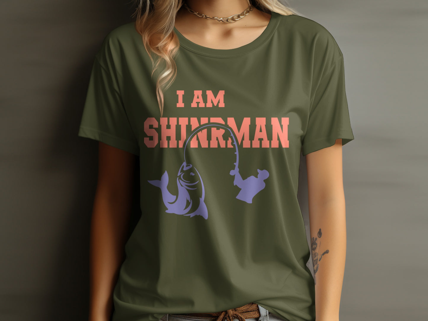 Green t-shirt with "I AM SHIRMAN" text and fishing graphic.