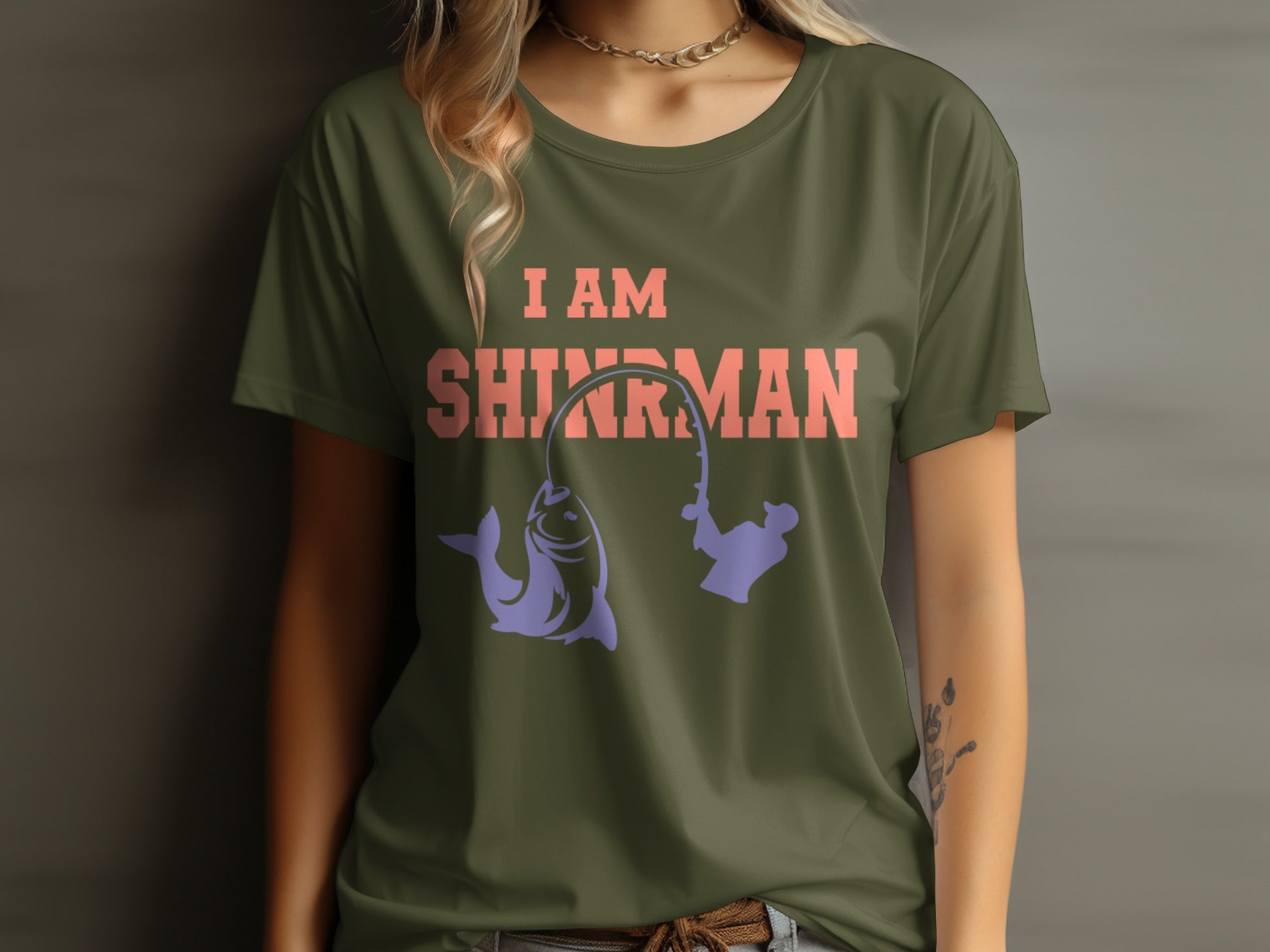 Green t-shirt with "I AM SHIRMAN" text and fishing graphic.
