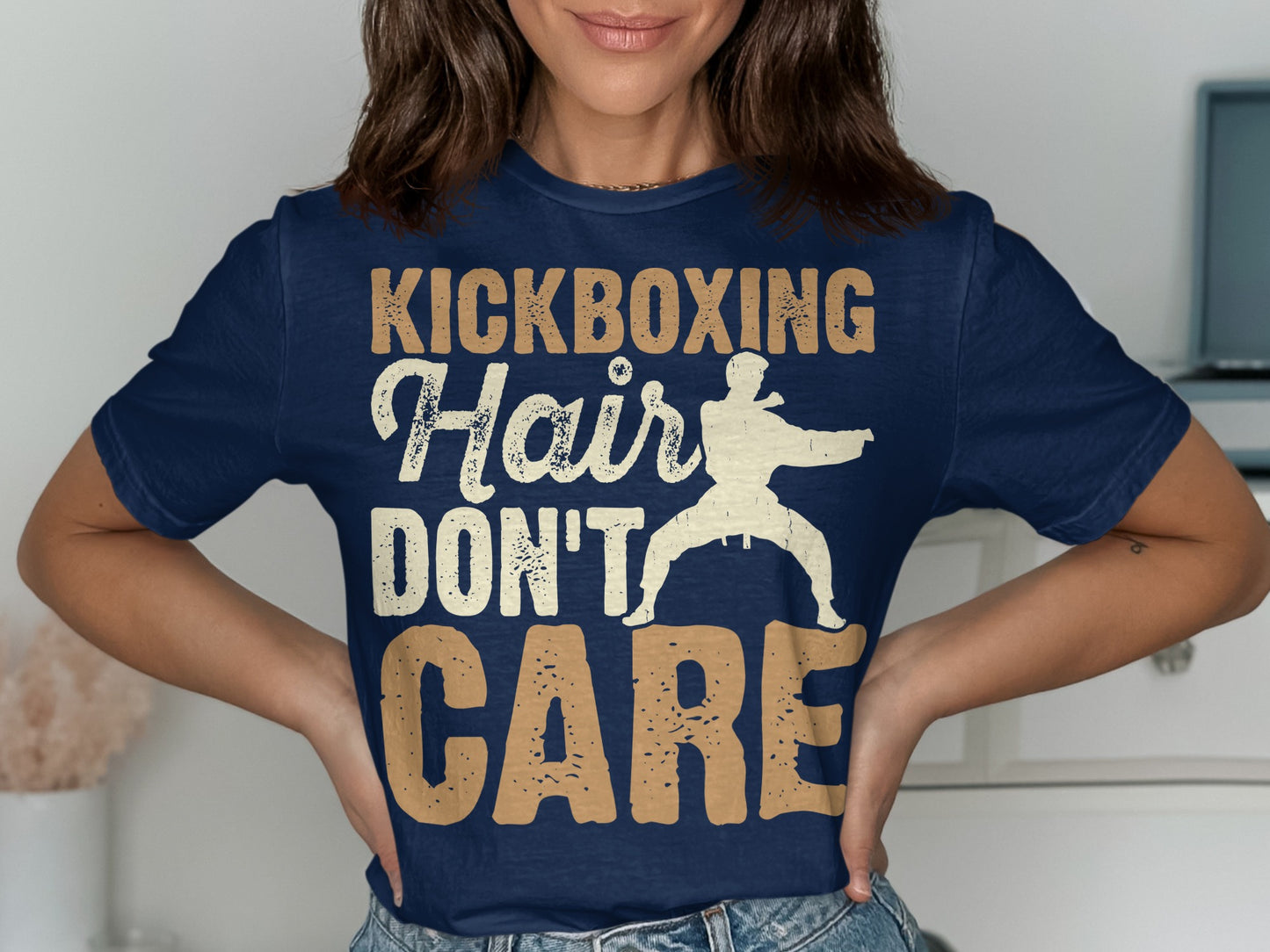 Navy t-shirt with "KICKBOXING HAIR DON'T CARE" text and a martial artist graphic.