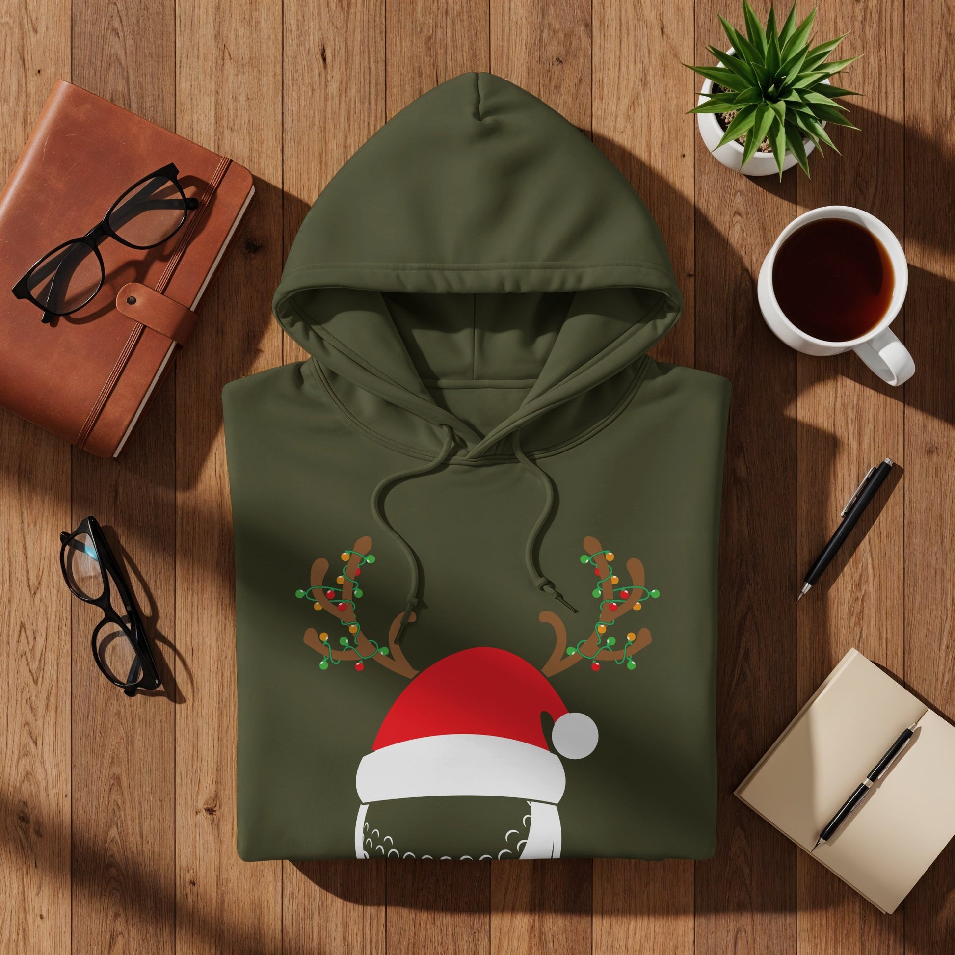 Olive green hoodie with Santa hat and reindeer antlers graphic.