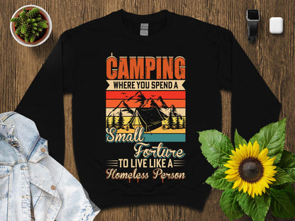 Black sweatshirt with "Camping Where You Spend a Small Fortune to Live Like a Homeless Person" text.