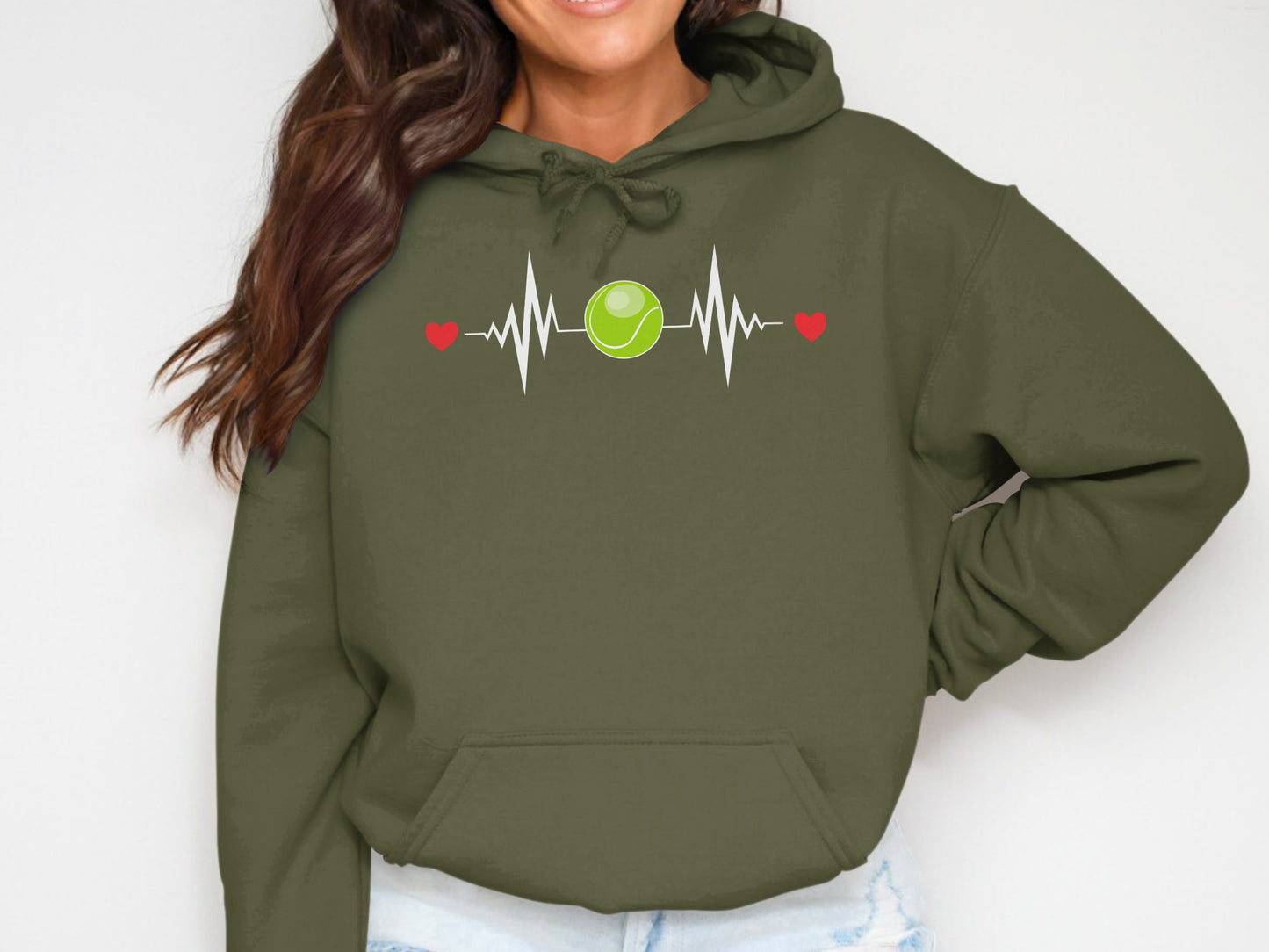 Green hoodie with tennis ball heartbeat graphic and red hearts.