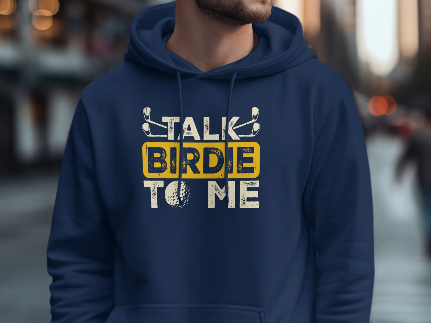 Men's navy hoodie with "Talk Birdie to Me" and golf ball graphic.