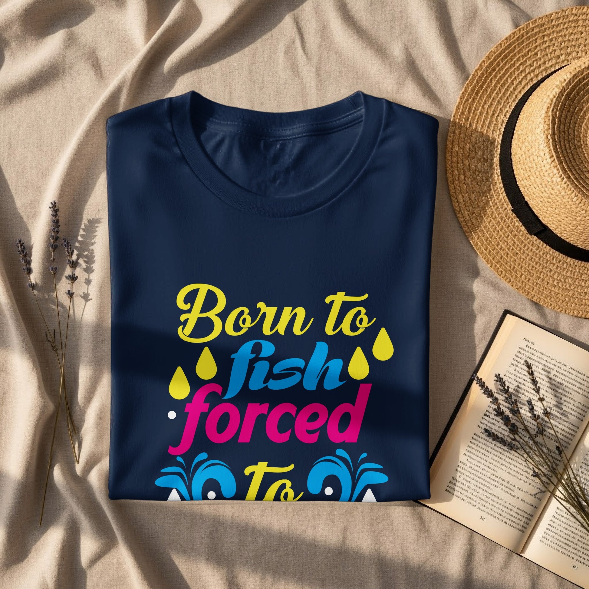 Navy t-shirt with "Born to fish, forced to work" text and fish design.