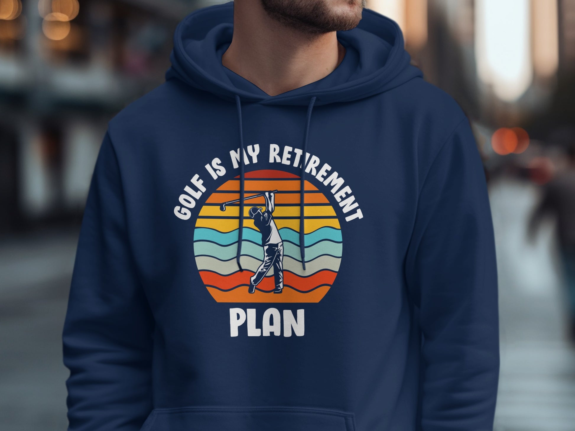Navy hoodie with "Golf is my retirement plan" text and golfer graphic.