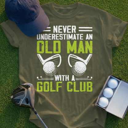 Olive green t-shirt with "Never Underestimate an Old Man With a Golf Club" graphic.