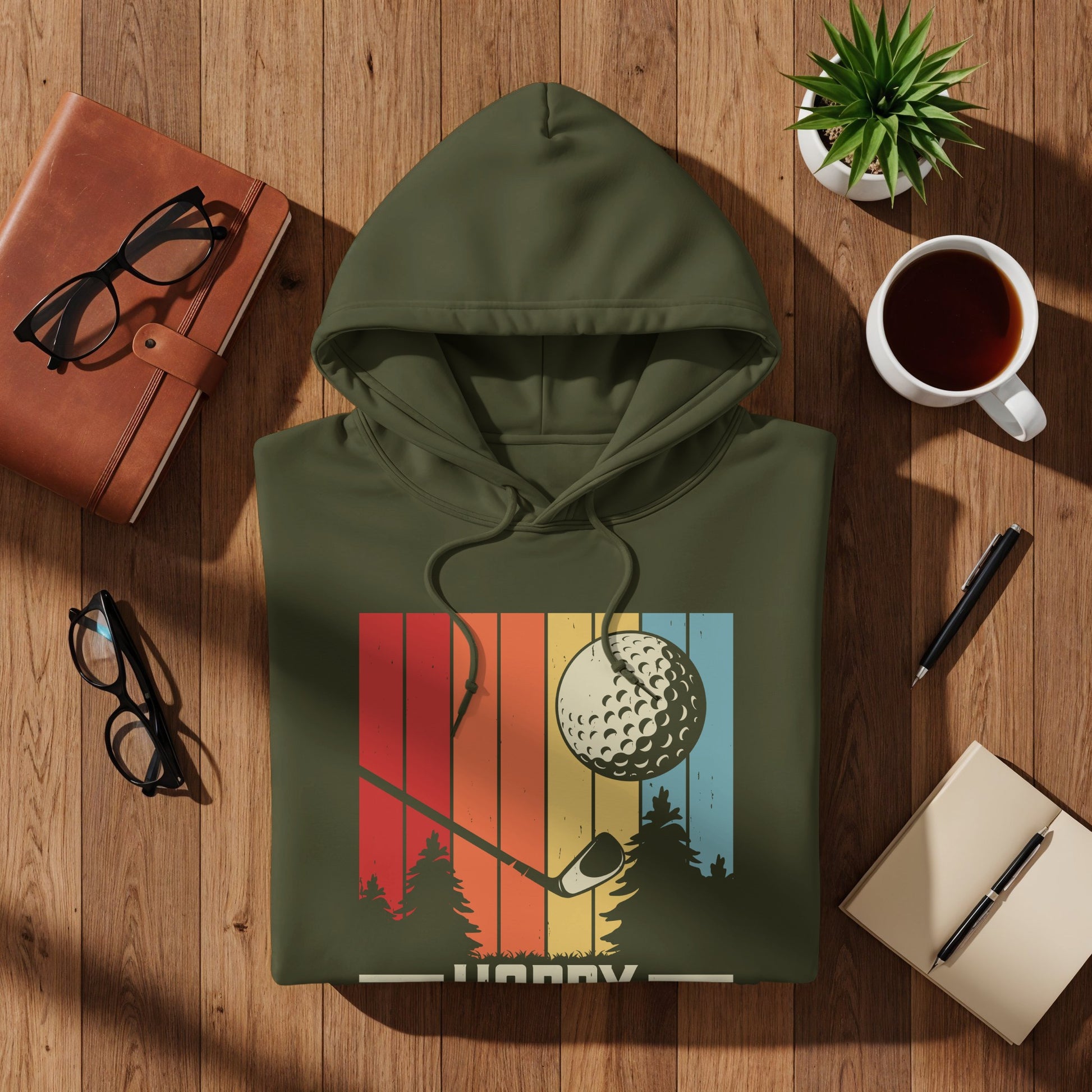 Olive green hoodie with vintage golf graphic and text.