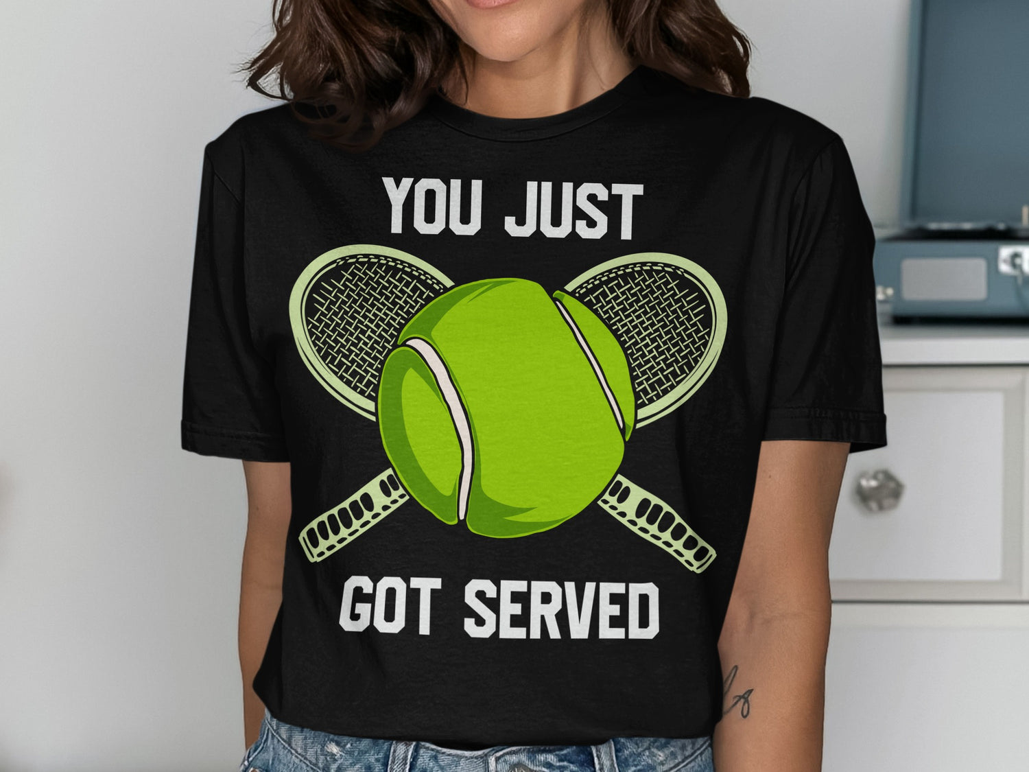 Black t-shirt with "YOU JUST GOT SERVED" and tennis ball and rackets.