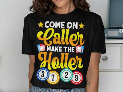 Black t-shirt with "Come On Caller Make The Holler" text and bingo balls.