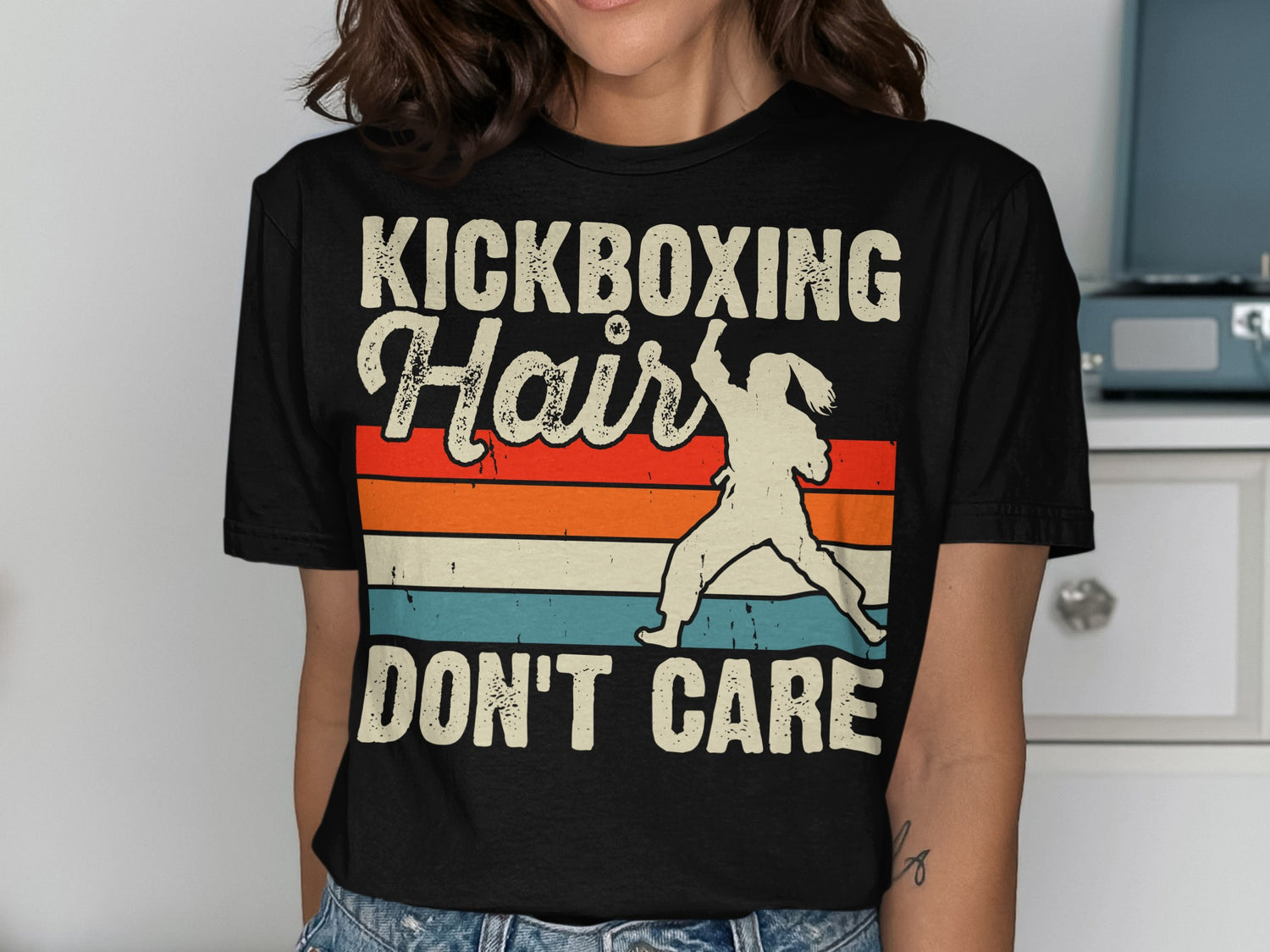 Black t-shirt with "KICKBOXING Hair DON'T CARE" and a kickboxer graphic.