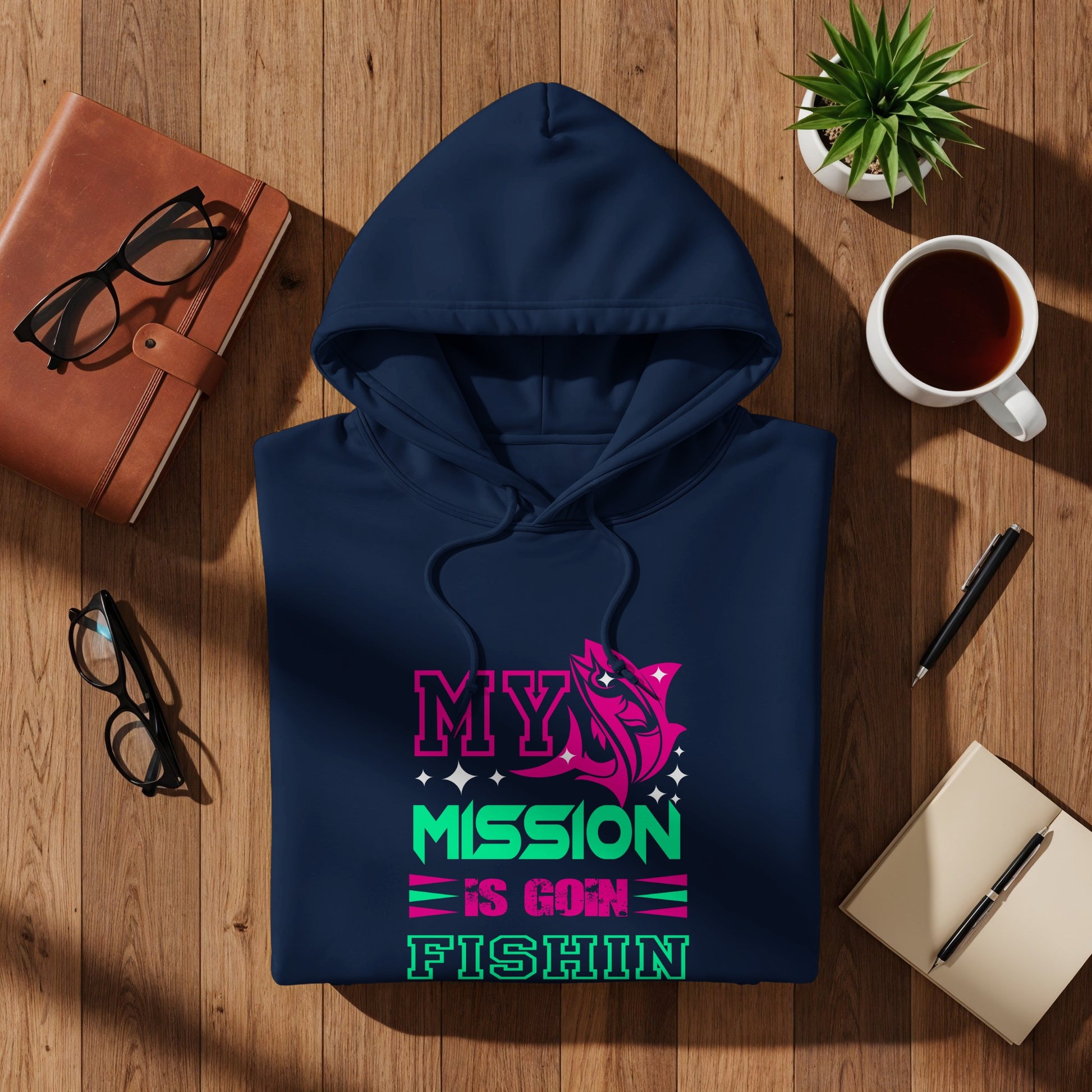 Navy blue hoodie with pink and green text "MY MISSION IS GOIN FISHIN".