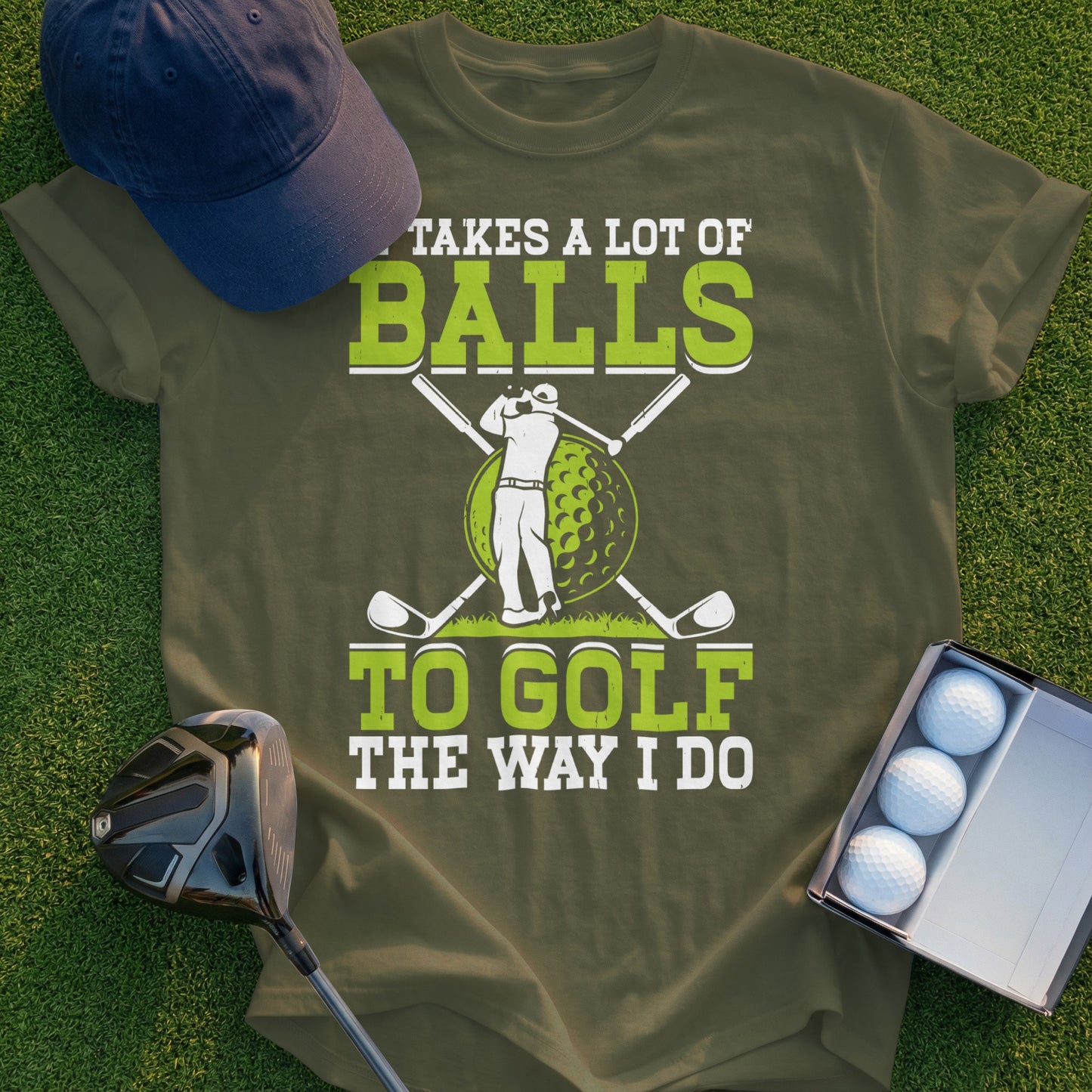 T-shirt with graphic of a golfer and text "TAKES A LOT OF BALLS TO GOLF THE WAY I DO".