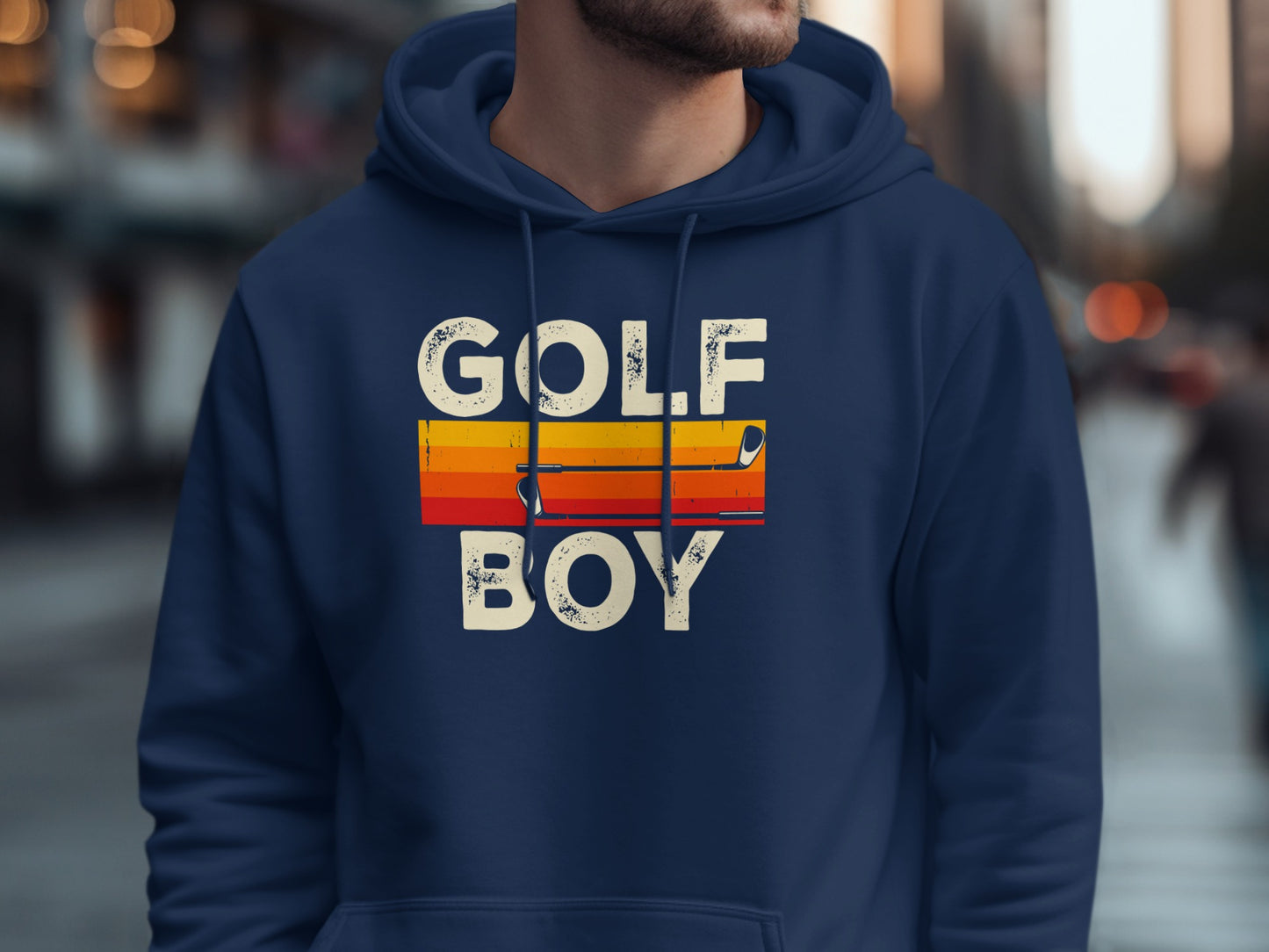 Navy hoodie with "GOLF BOY" text in retro, striped lettering.