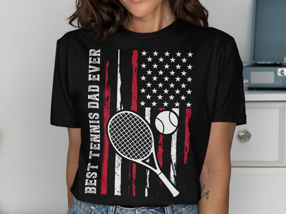 T-shirt with American flag, tennis racket, ball, and text.