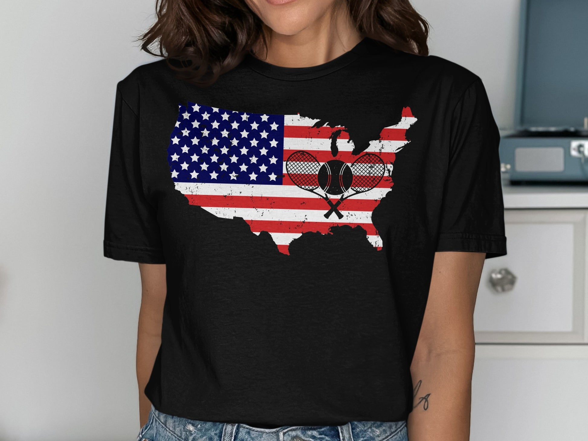 Black t-shirt with US map flag design featuring crossed tennis rackets.