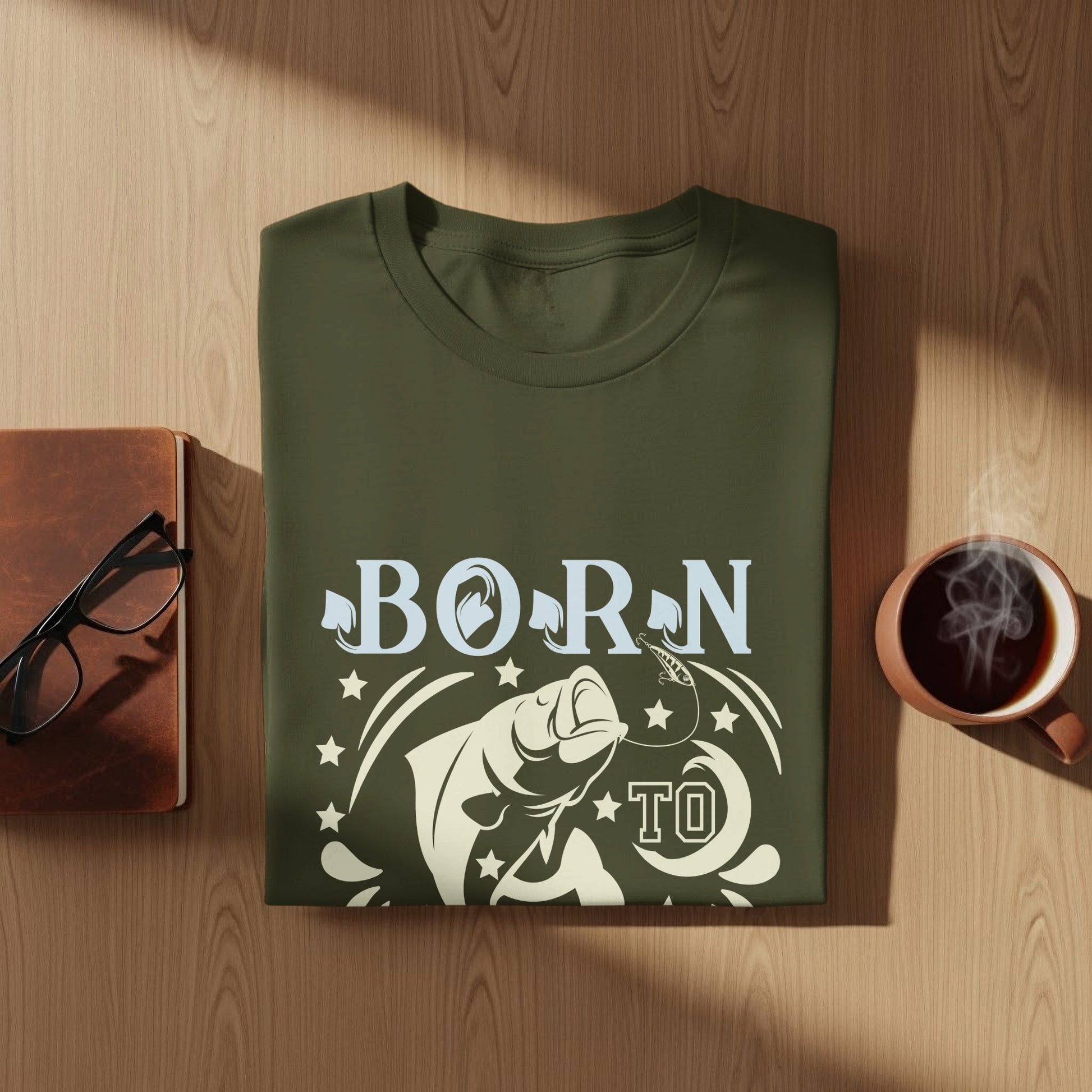 Green t-shirt with "BORN TO FISH" text and a jumping fish graphic.