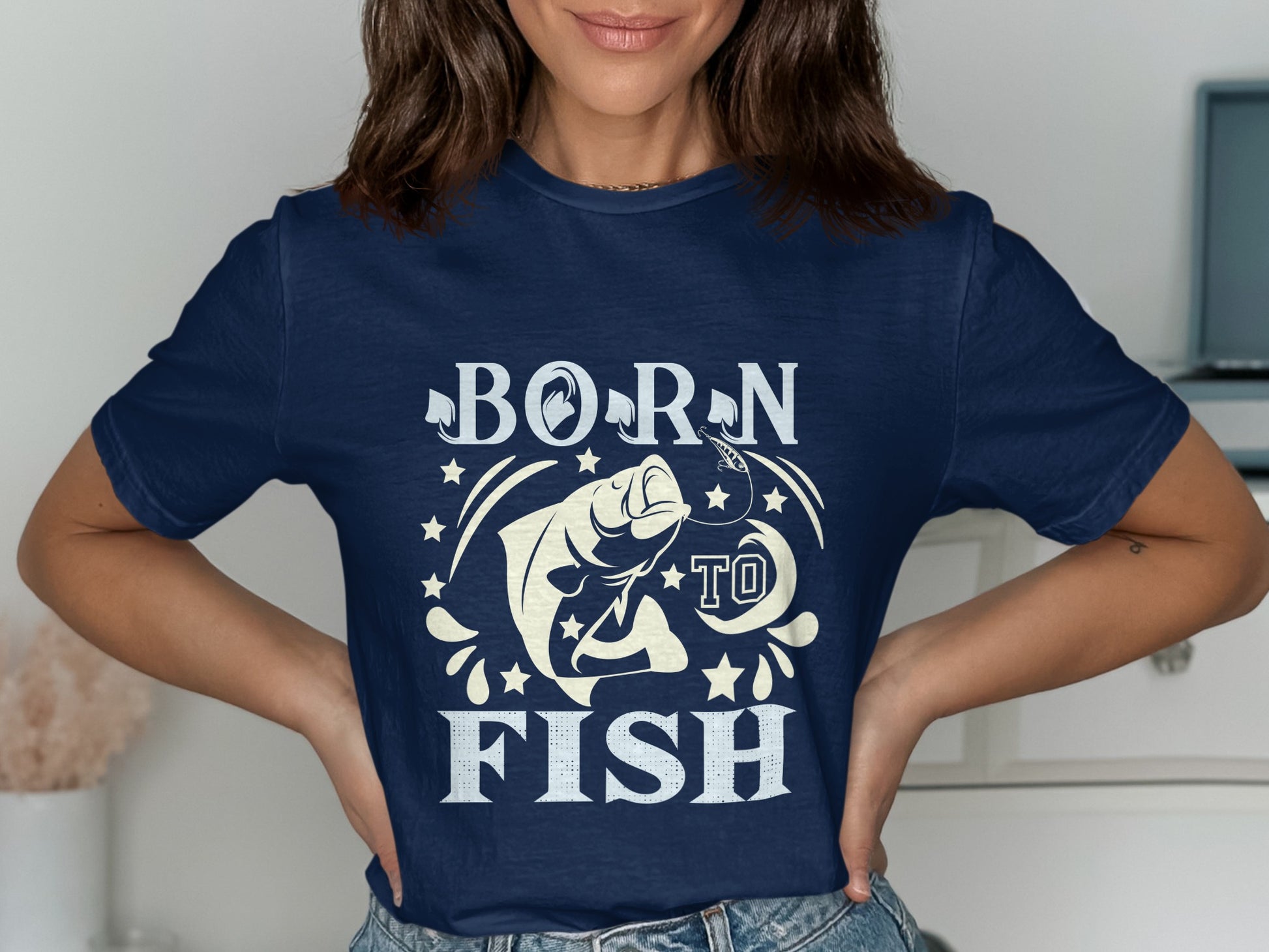 Navy t-shirt with "BORN TO FISH" text and a leaping fish graphic.