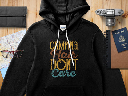 Black Gildan hoodie with "Camping Hair Don't Care" text and graphic.