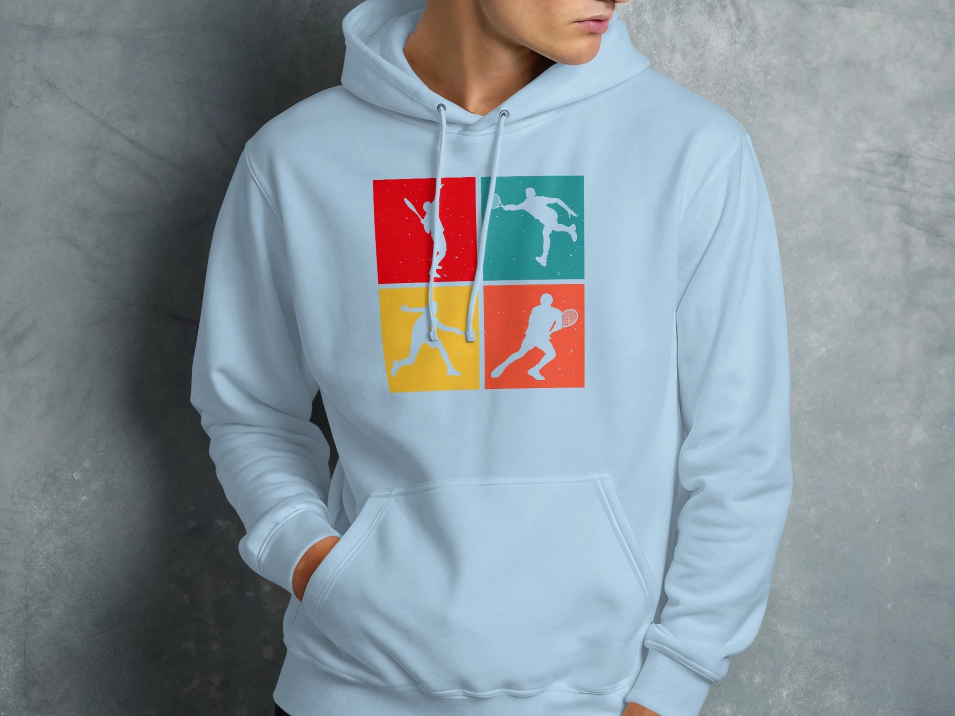 Light blue hoodie with four colorful tennis player silhouettes on the chest.
