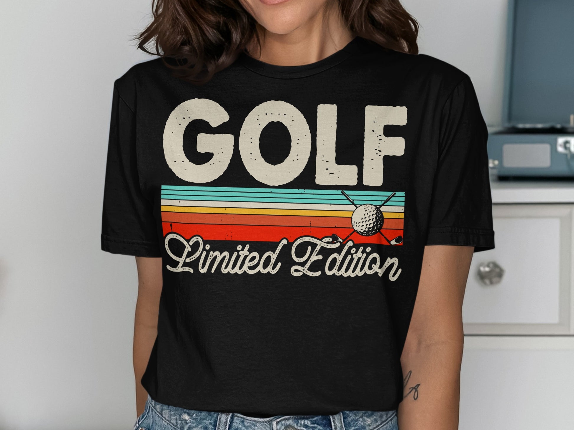 Black t-shirt with "GOLF Limited Edition" text and golf ball graphic.