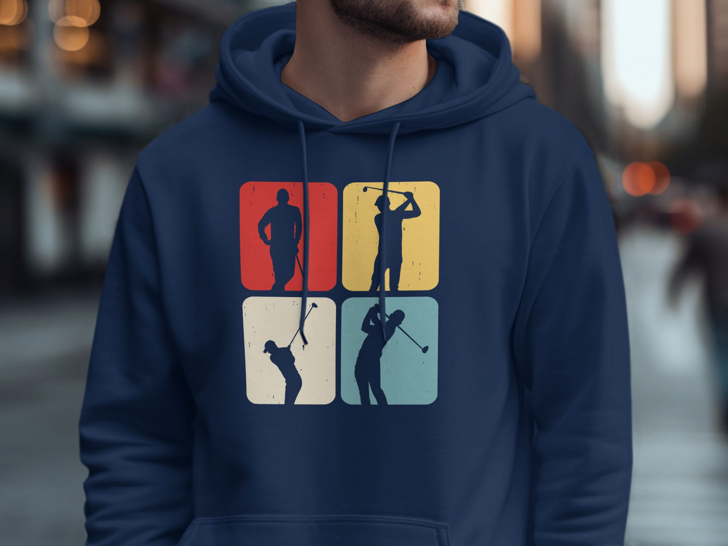 Navy hoodie with four retro golf silhouette squares: golfer swinging, putting, and preparing.