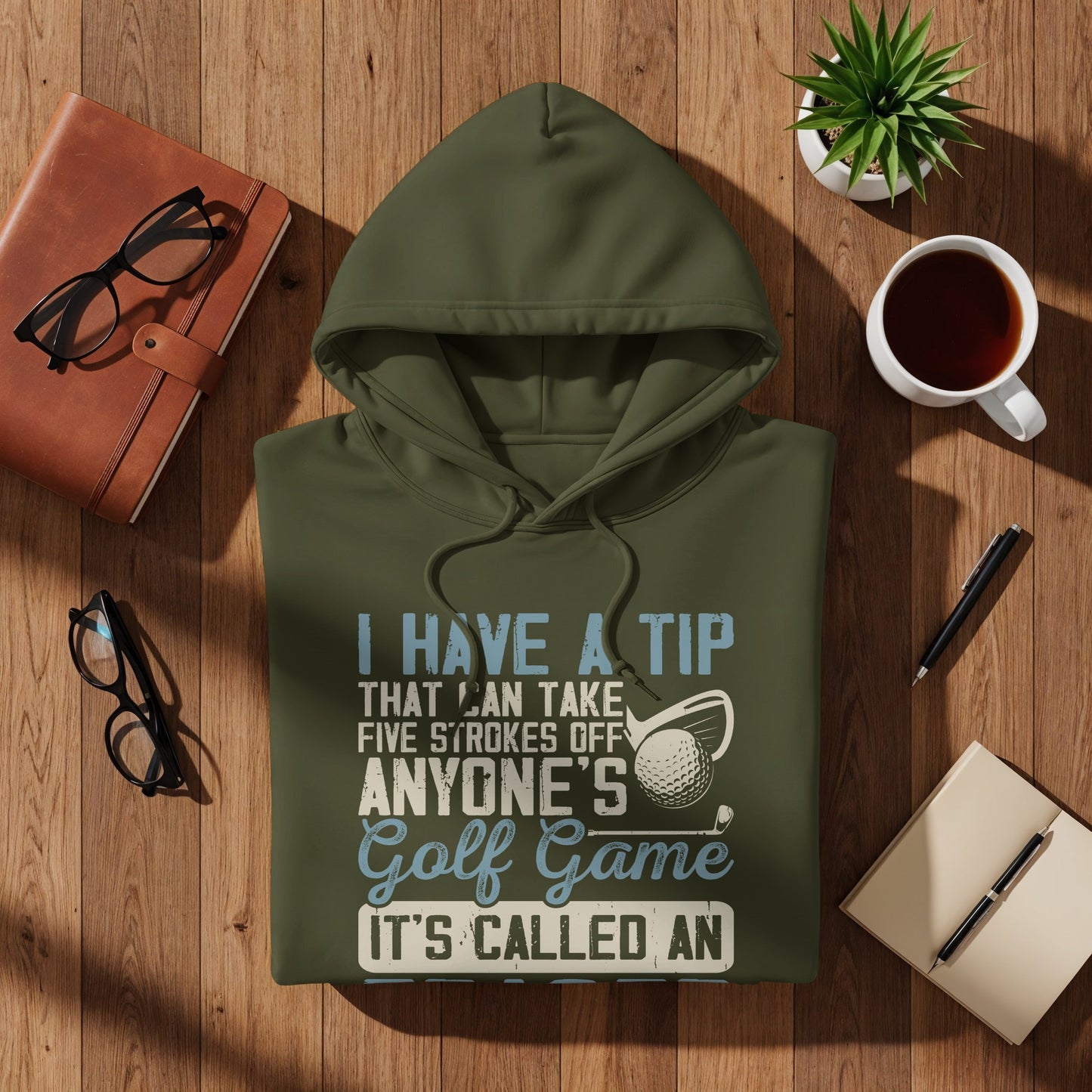 Olive green hoodie with text about improving one's golf game.
