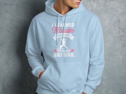 Light blue hoodie with "I learned karate using both heart and soul" text.