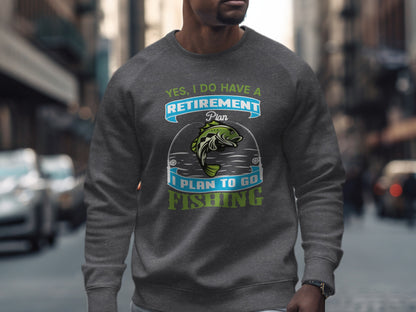 Grey sweatshirt with "Yes, I Do Have A Retirement Plan I Plan To Go Fishing" text.