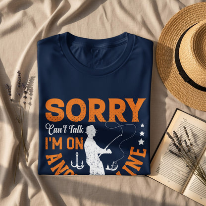 Navy t-shirt with "Sorry Can't Talk I'm On My Line" text and fishing graphic.