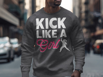 Grey sweatshirt with "KICK LIKE A Girl" text and a kicking silhouette.