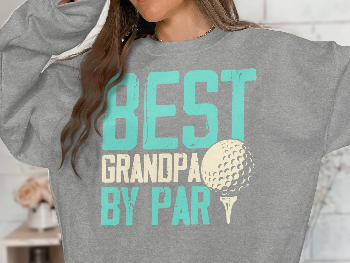 Grey sweatshirt with "BEST GRANDPA BY PAR" text and a golf ball graphic.