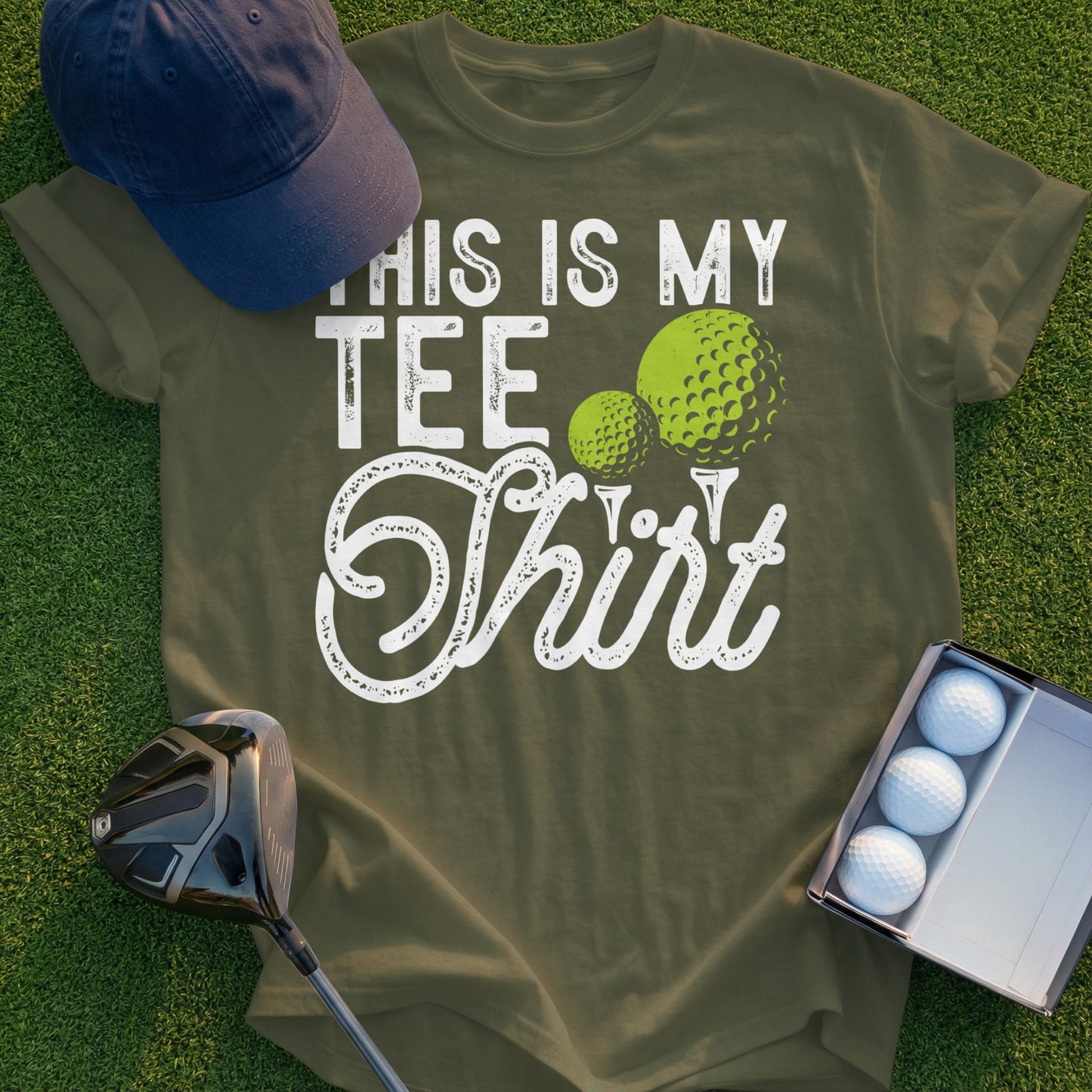 Olive green t-shirt with "This is my Tee Shirt" and golf ball graphics.