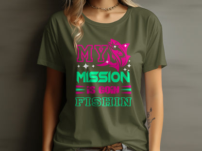 Olive green t-shirt with "MY MISSION IS GOIN FISHIN" text and pink fish graphic.
