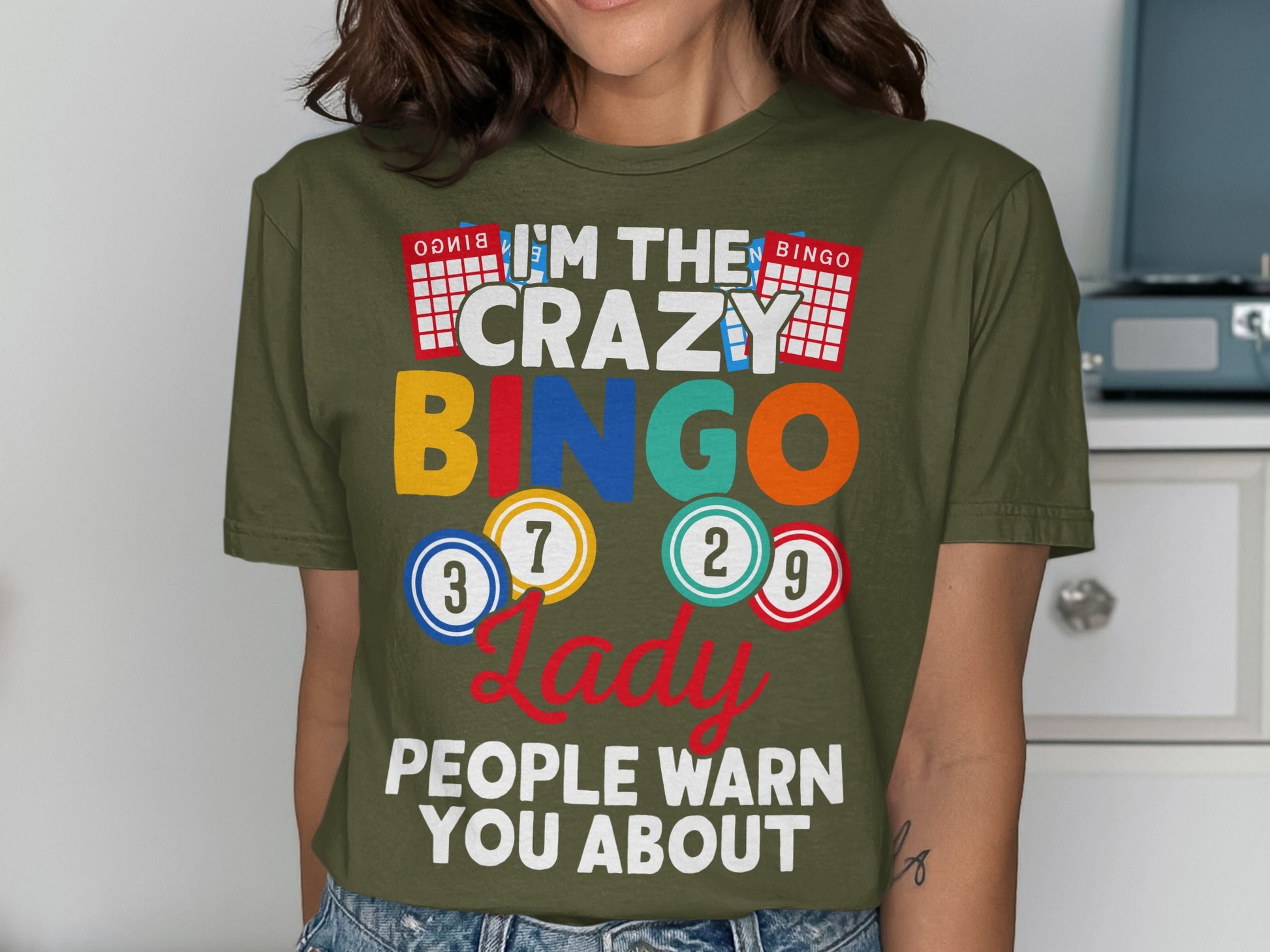 Green t-shirt with "I'm the crazy Bingo lady people warn you about" text.