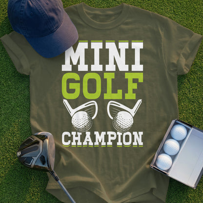 Green t-shirt with "Mini Golf Champion" text and golf balls.