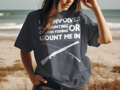 Dark t-shirt with white text and gun and fishing pole graphics.