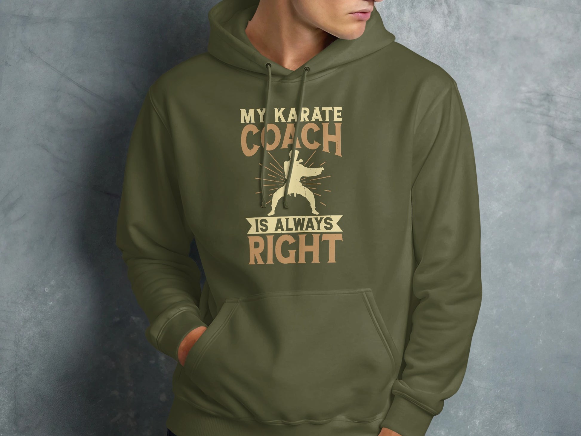 Olive green hoodie with "My Karate Coach Is Always Right" text and karate graphic.