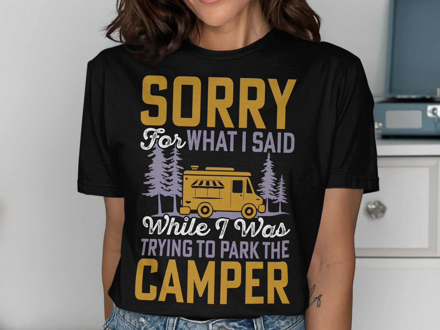 Black t-shirt with "Sorry for what I said while I was trying to park the camper" text and graphic.