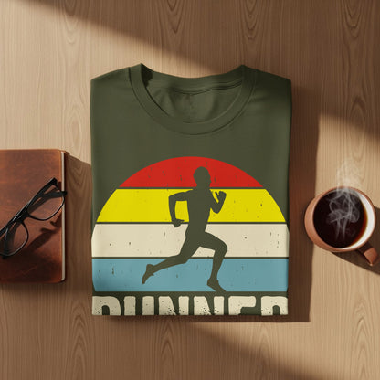 Olive green t-shirt with runner silhouette against colorful stripes and text.