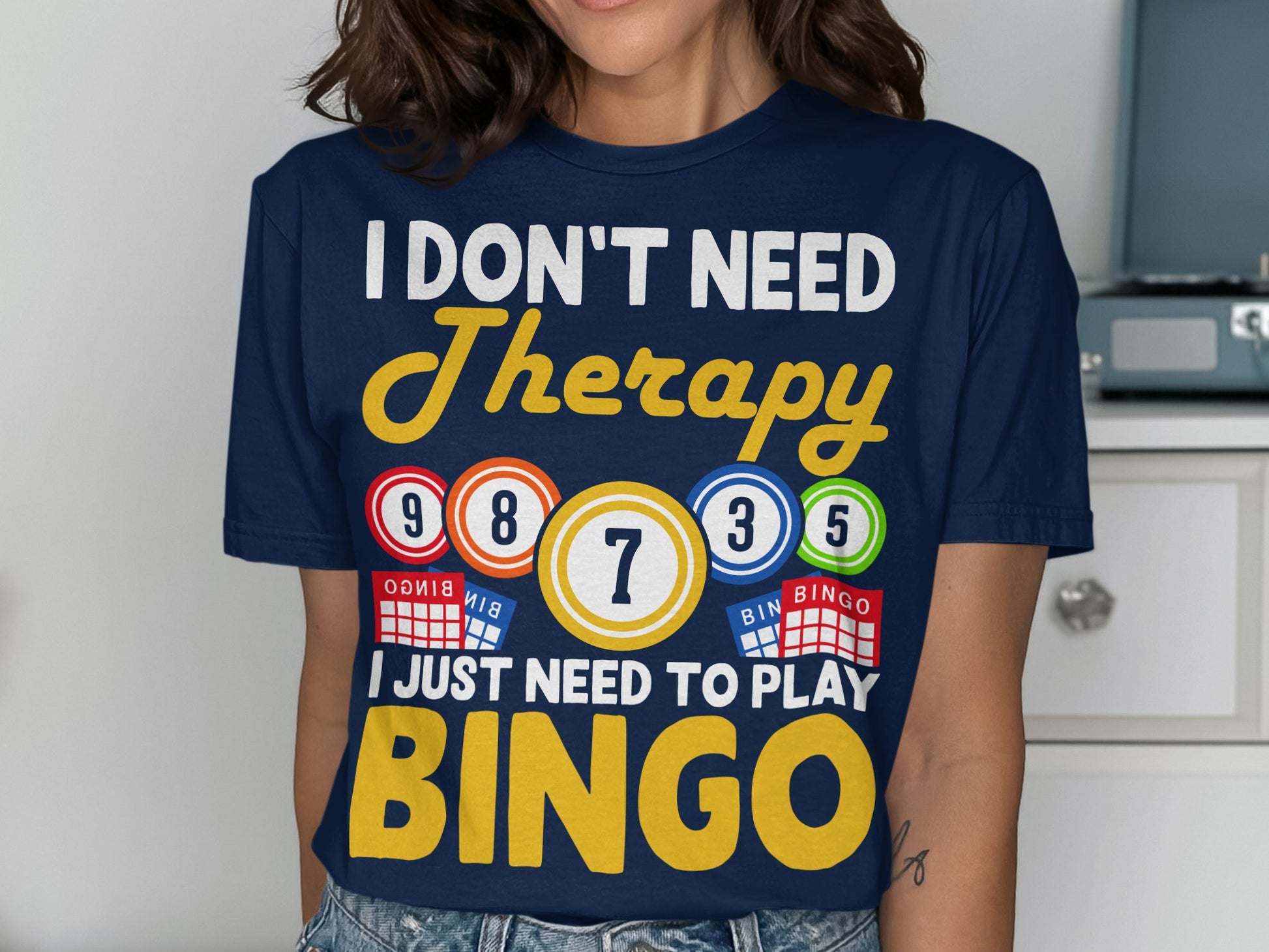 Navy t-shirt with "I DON'T NEED Therapy I JUST NEED TO PLAY BINGO" and bingo balls.
