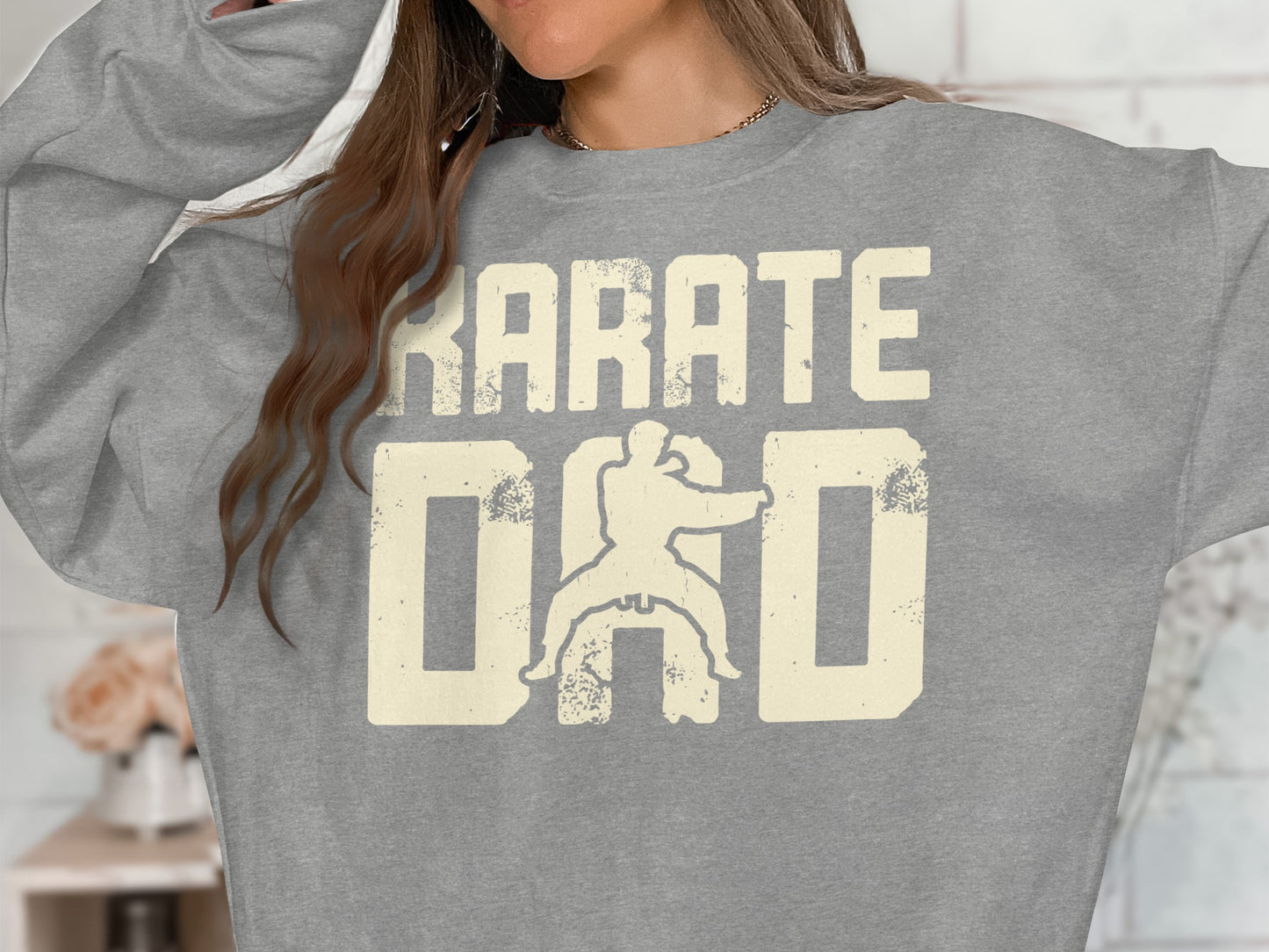 Grey sweatshirt with distressed "KARATE DAD" text and a silhouette of a karate fighter.