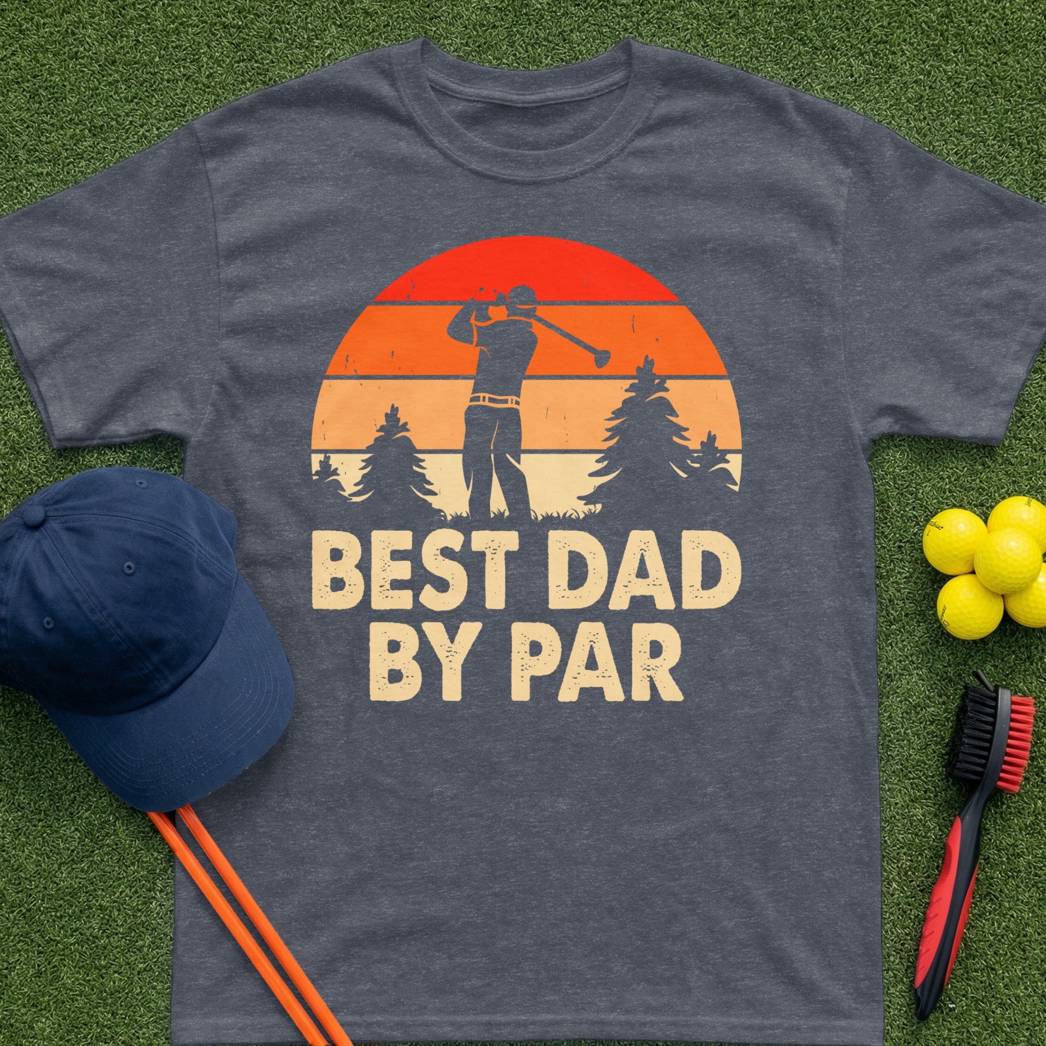 Dark grey t-shirt with sunset graphic and "BEST DAD BY PAR" text.