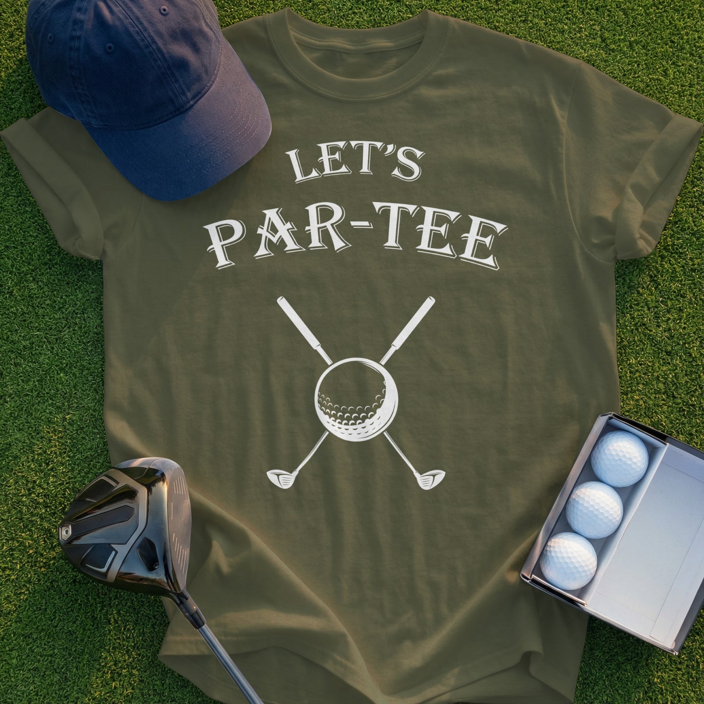 Olive t-shirt with "Let's Par-Tee" text, crossed clubs, golf ball, and cap.