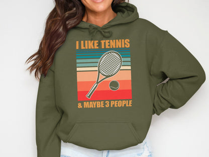 Olive green hoodie with "I like tennis & maybe 3 people" text and tennis racket graphic.
