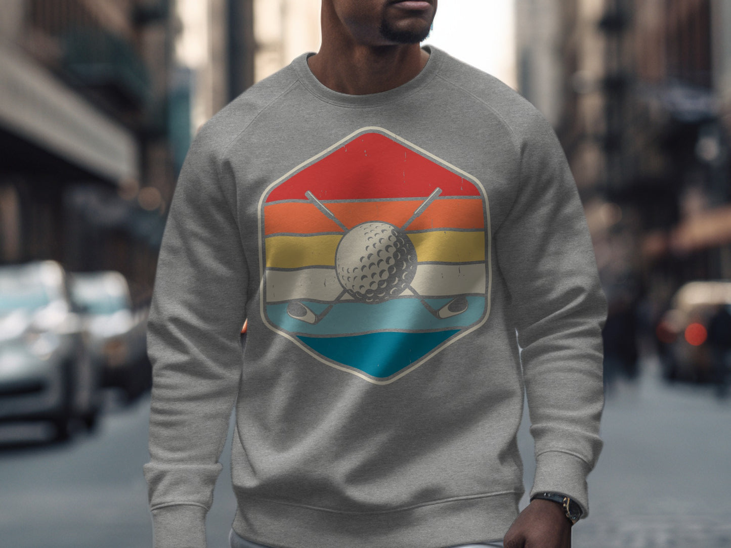 Gray sweatshirt with a vintage golf graphic of a golf ball and clubs.