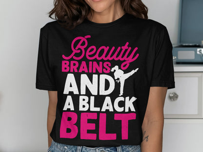 Black t-shirt with pink text "Beauty Brains AND A BLACK BELT" and a martial artist silhouette.