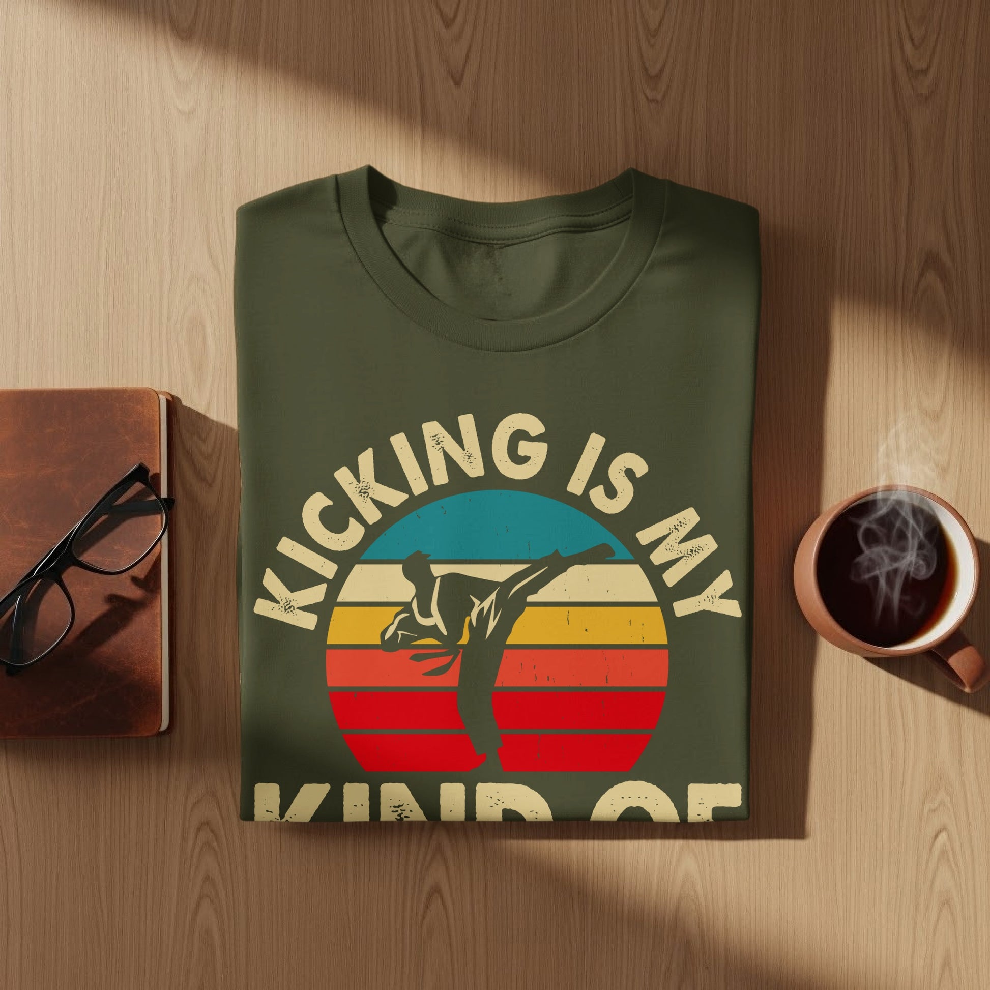 Olive t-shirt with "KICKING IS MY KIND OF" text and silhouetted martial artist.