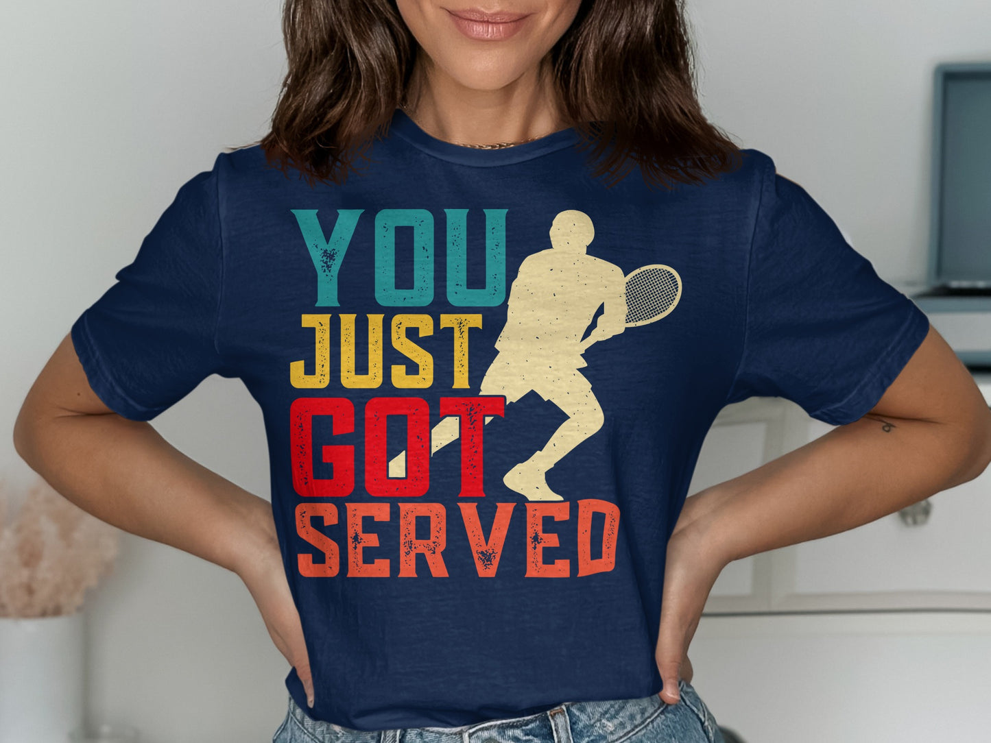 Navy t-shirt with "YOU JUST GOT SERVED" text and tennis player graphic.