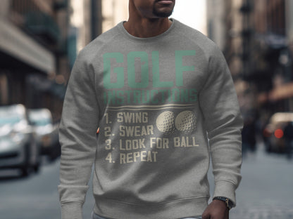 Gray sweatshirt with "GOLF INSTRUCTIONS" and golf balls.