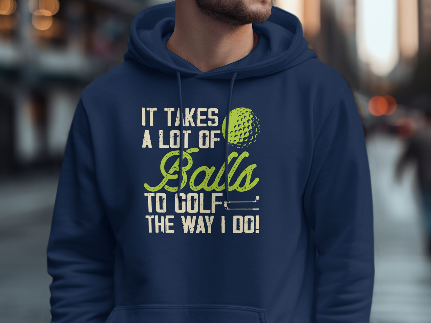Navy blue hoodie with "It takes a lot of balls to golf the way I do!" text.